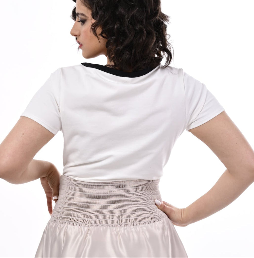 Tuamoto Top In Cream With Black Trim And Bow