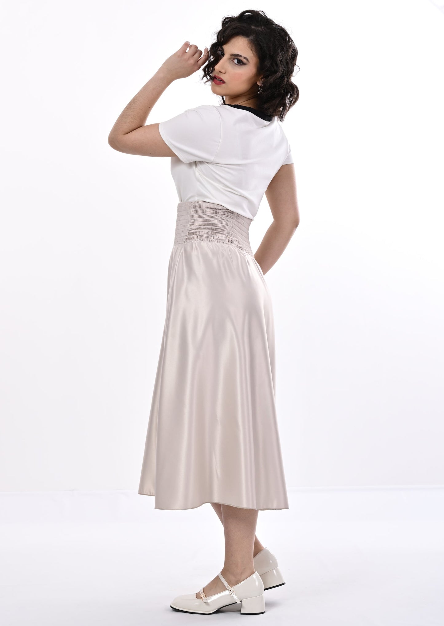 Tuamoto Top In Cream With Black Trim And Bow