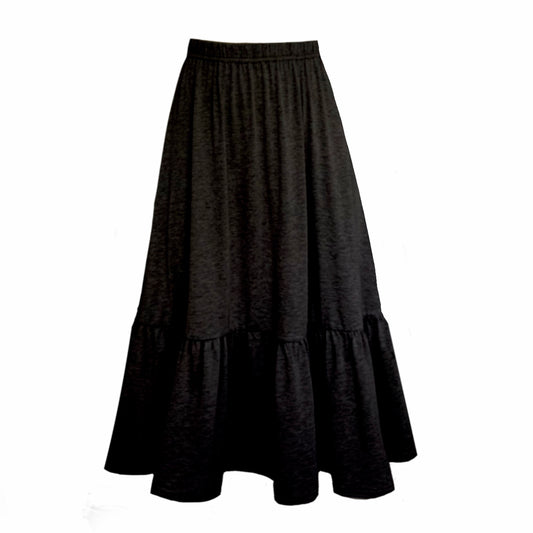 This is a boho gathered midi skirt with pockets in black silhouetted against a white background.