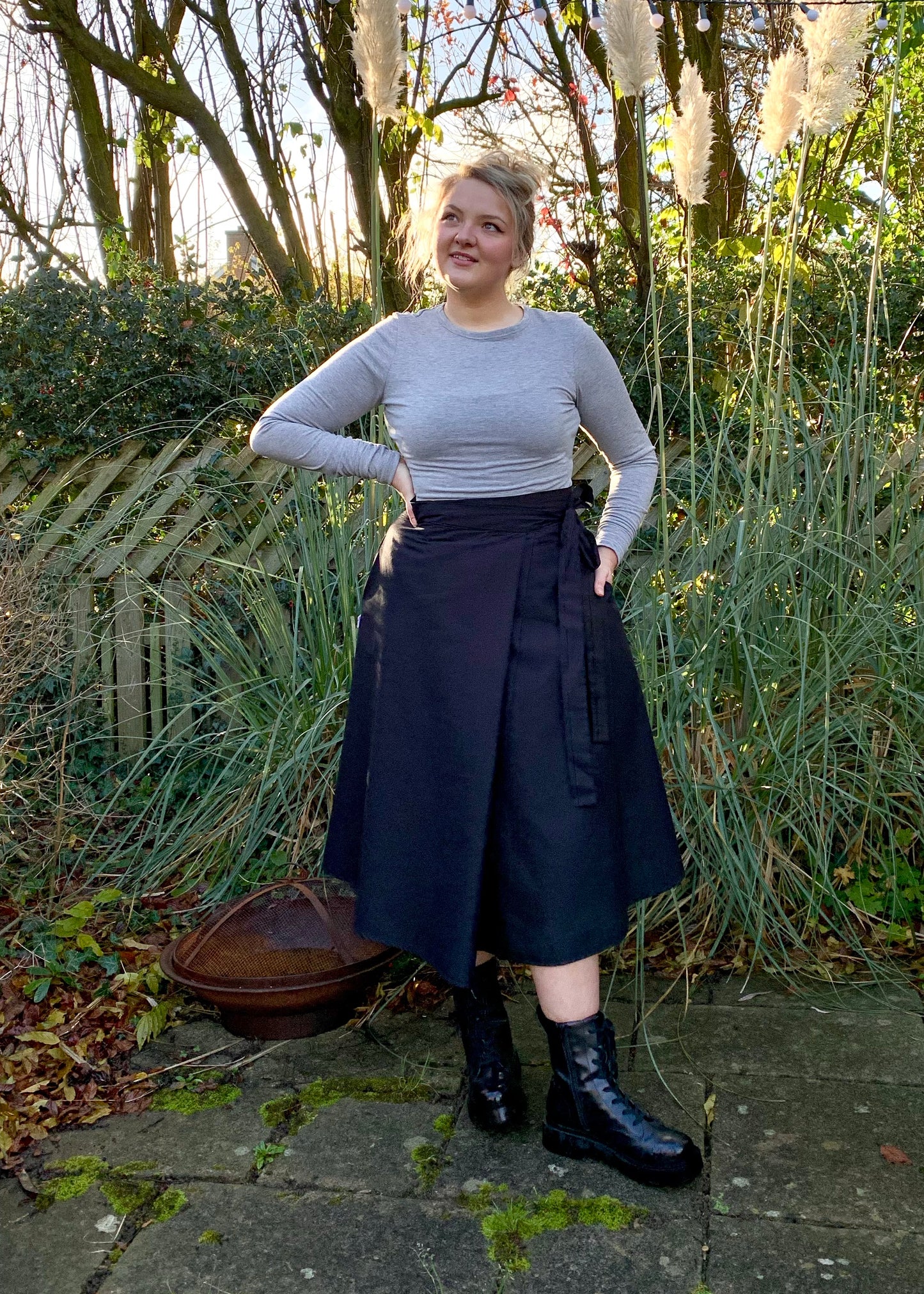 Illusion Wrap Midi Skirt In Black With Pockets