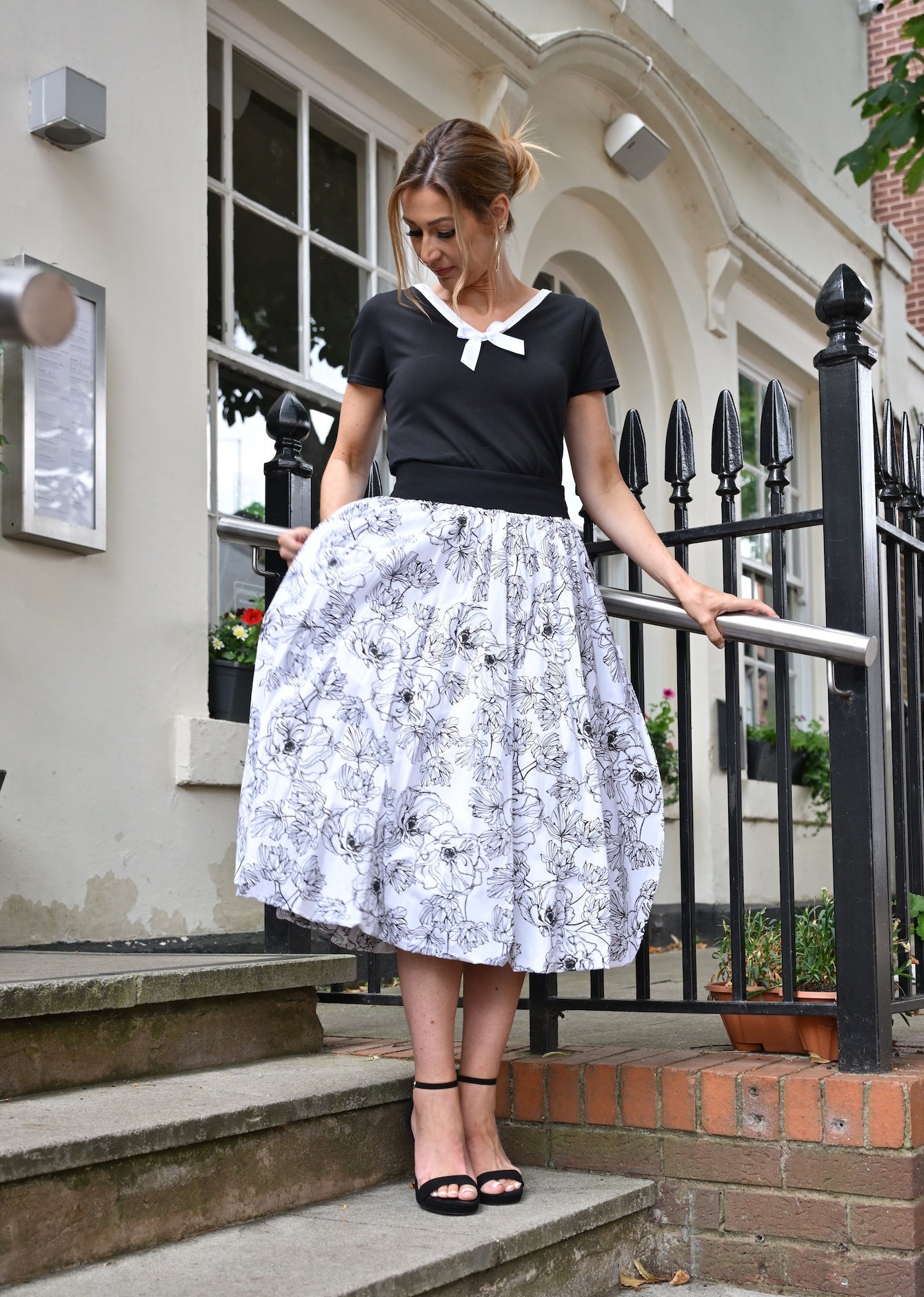 Tuamoto Top In Black With White Trim and Bow