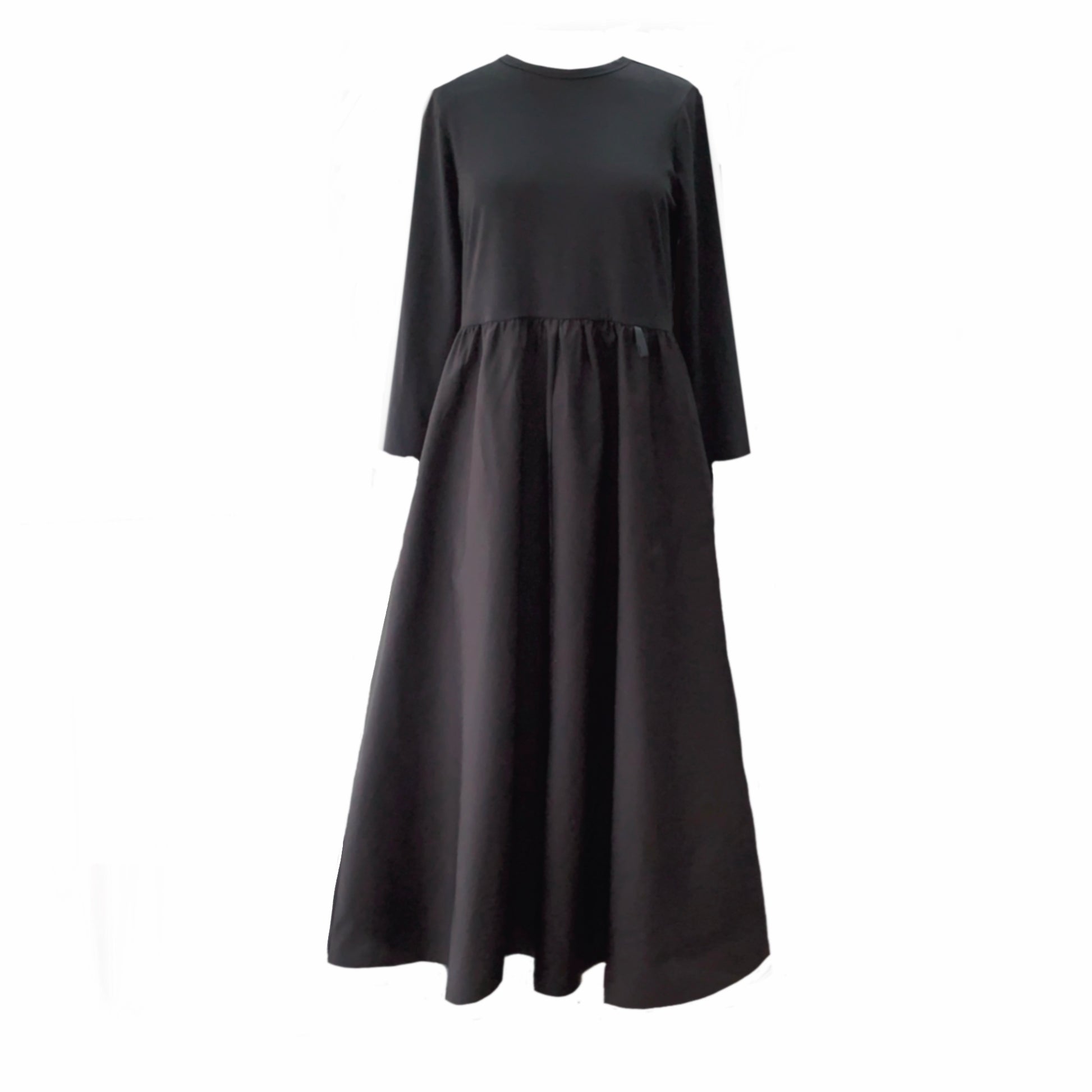 This is a black midi/maxi length dress with long sleeves and a round neck with a gathered skirt.