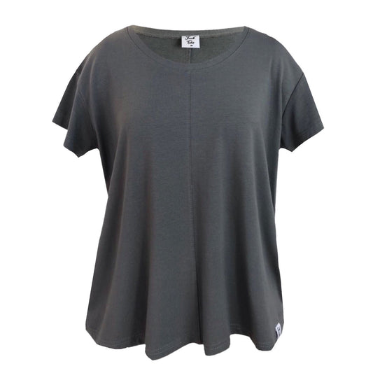This a scoop neck short sleeve tee in steel silhouetted against a white background. The shoulders are dropped. There is a seam down the centre front as a feature.